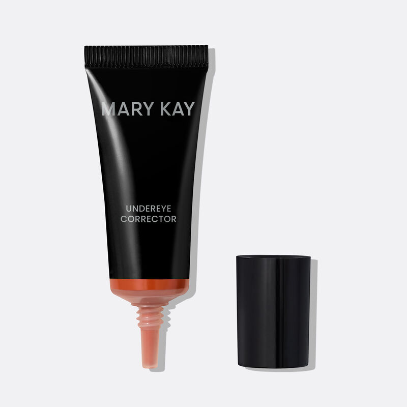 Black Mary Kay&trade; Undereye Corrector Bottle in deep peach with the cap removed, showcasing the needle nose